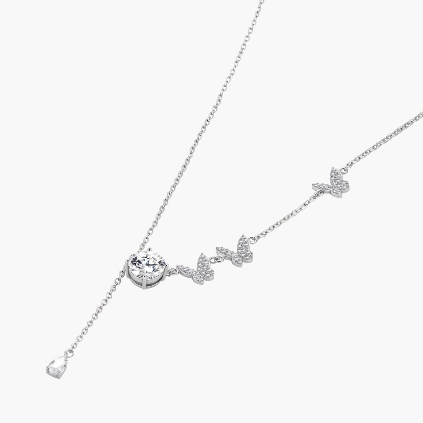 Sterling silver Y-shaped necklace with butterfly charms and brilliant moissanite stone with teardrop pendant