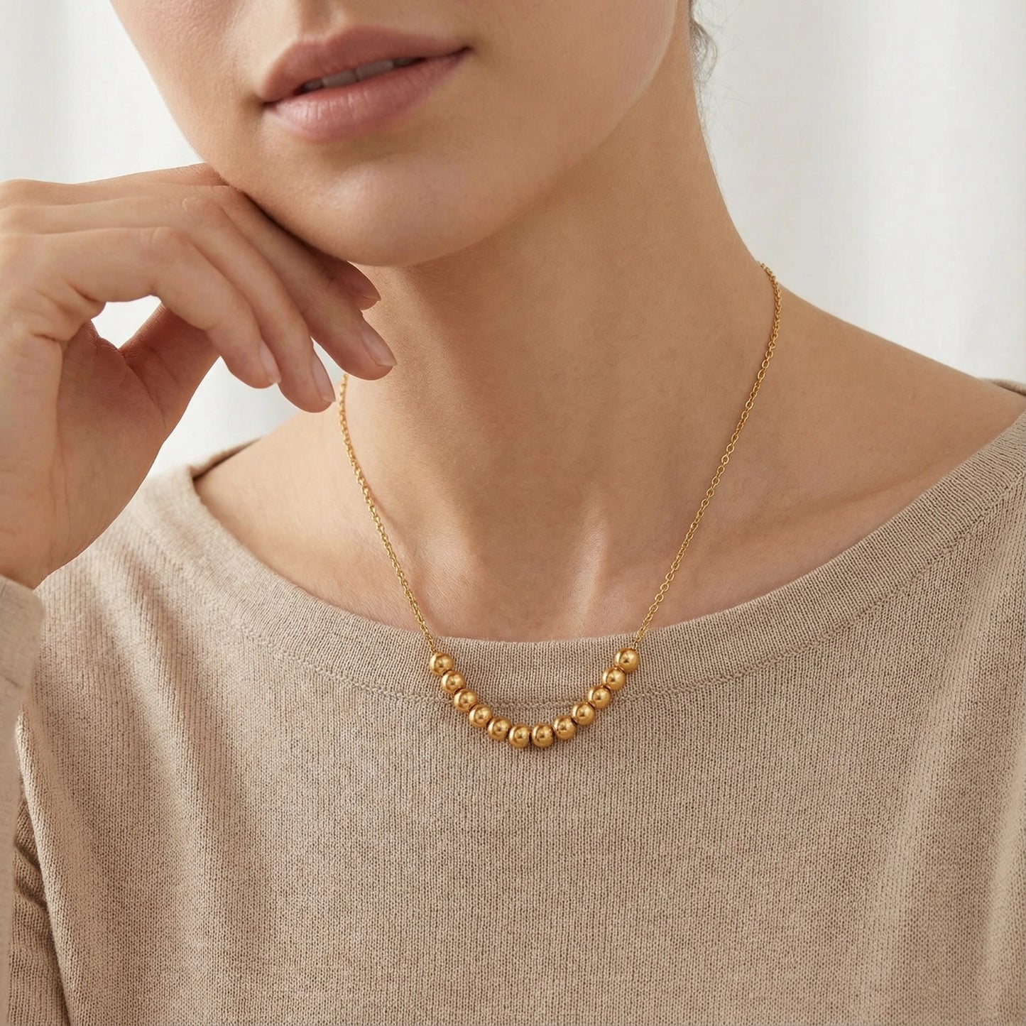 Golden Sphere Necklace – 18K Gold-Kette mit graduiertem Perlen-Element
