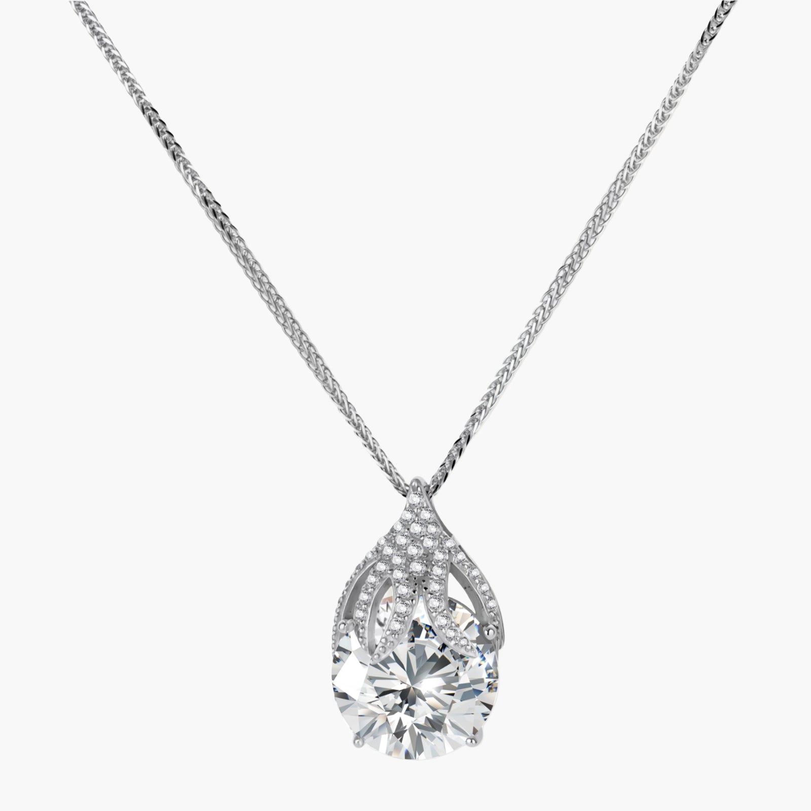 Sterling silver necklace featuring a large pear-shaped moissanite stone in an ornate setting with smaller accent stones