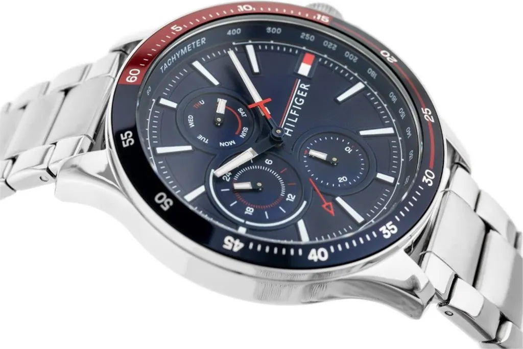 Tommy Hilfiger Bank Herrenuhr 1791718 | Multifunktion & Tachymeter | Silbernes Edelstahlarmband & Blaues Zifferblatt