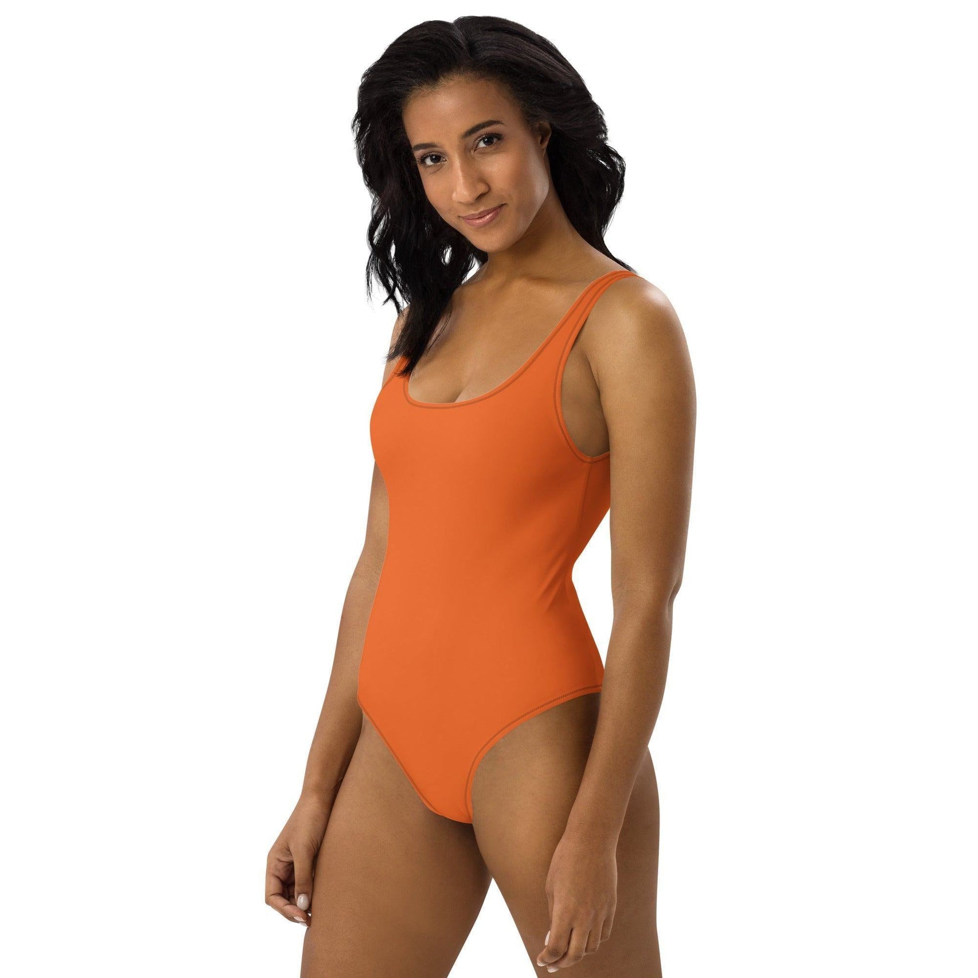 Einteiliger Orange Badeanzug mit Cheeky Passform Badeanzug 49.99 Ausschnitt, Cheeky, Design, einfarbig, Elastan, elegant, Fashion, Mode, orange, Passform, Polyester, Rückenausschnit, Stretchmaterial, Style, UPF50 JLR Design