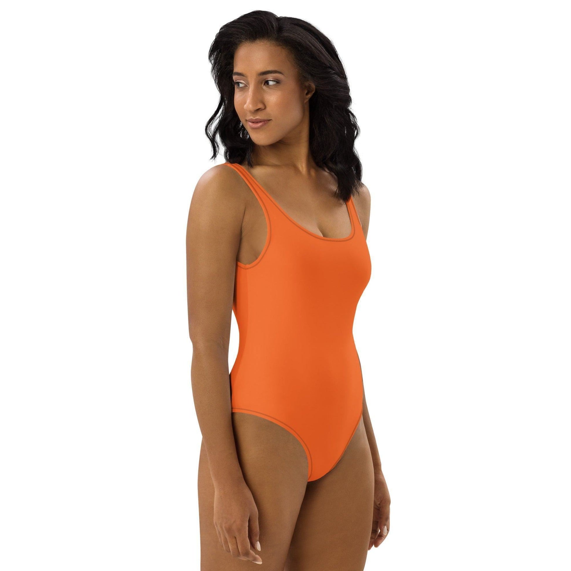 Einteiliger Orange Badeanzug mit Cheeky Passform Badeanzug 49.99 Ausschnitt, Cheeky, Design, einfarbig, Elastan, elegant, Fashion, Mode, orange, Passform, Polyester, Rückenausschnit, Stretchmaterial, Style, UPF50 JLR Design